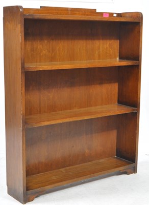 Lot 964 - OAK OPEN FOUR SHELF BOOKCASE WITH RAISED DETAIL TO GALLERIED TOP