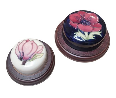 Lot 167 - MOORCROFT - TWO 20TH CENTURY CERAMIC AND WOODEN PAPERWEIGHTS
