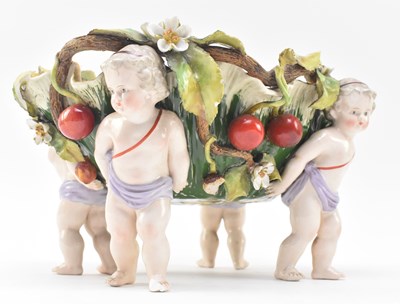 Lot 10 - GERMAN 19TH CENTURY HAND PAINTED PORCELAIN CHERUB BASKET