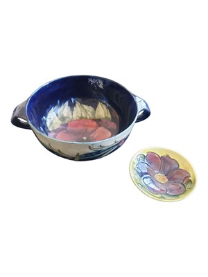 Lot 181 - MOORCROFT - TWO 20TH CENTURY FLORAL DESIGN POTTERY BOWLS