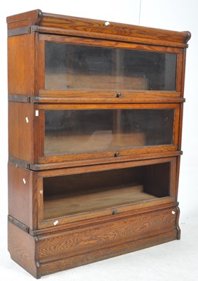 Lot 940 - EARLY 20TH CENTURY OAK BARRISTERS STACKING BOOKCASE