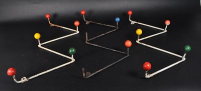 Lot 875 - THREE MID CENTURY ATOMIC ZIG - ZAG WALL COAT RACKS