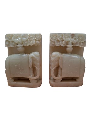 Lot 301 - PAIR OF INDIAN CARVED SOAPSTONE ELEPHANT BOOKENDS