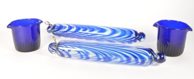 Lot 182 - TWO 19TH CENTURY NAILSEA GLASS ROLLING PINS AND COBALT BLUE GLASSES