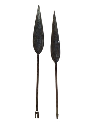 Lot 317 - TWO 20TH CENTURY AFRICAN TRIBAL CARVED HARDWOOD SPEARS / PADDLES