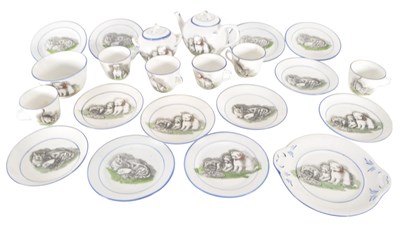 Lot 197 - CIRCA 1900 CHINA CHILD'S TEA SERVICE WITH CAT AND DOG TRANSFER DESIGN