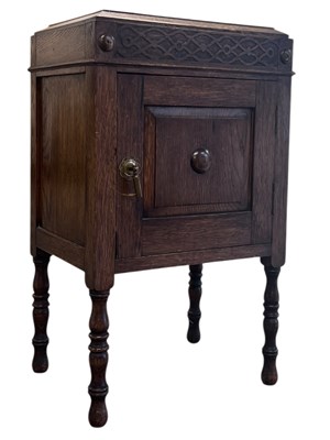 Lot 795 - 1920s OAK JACOBEAN REVIVAL POT BEDSIDE CABINET