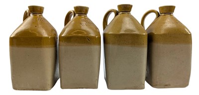 Lot 36 - SET OF FOUR 19TH CENTURY STONEWARE SPIRITS FLAGONS