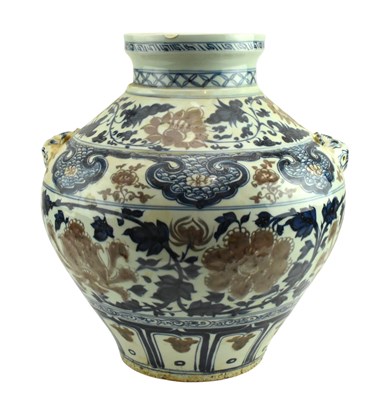 Lot 77 - CHINESE YUAN STYLE BLUE AND WHITE WITH COPPER RED JAR 青花釉里红牡丹如意纹罐