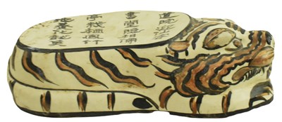 Lot 152 - CHINESE CIZHOU CERAMIC PILLOW IN THE FORM OF A TIGER 磁州老虎枕