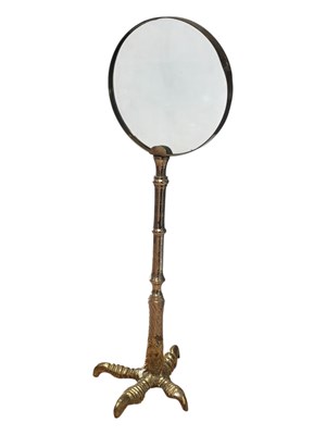 Lot 201 - EDWARDIAN 20TH CENTURY BRASS MAGNIFYING GLASS ON CLAWFOOT STAND