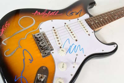 Lot 12 - OASIS (ENGLISH ROCK BAND) - RARE FULL BAND SIGNED GUITAR - AFTAL