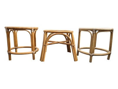 Lot 627 - THREE MID CENTURY BAMBOO & GLASS SIDE TABLES