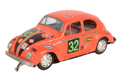 Lot 519 - VINTAGE 1970s TAIYO 'LOVE LOVE BEETLE' TINPLATE CAR