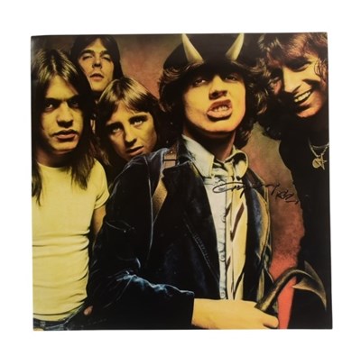 Lot 118 - AC/DC - ANGUS YOUNG - AUTOGRAPHED 12X12" PHOTOGRAPH