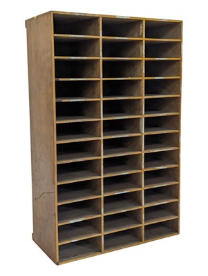Lot 829 - BRITISH MODERN DESIGN - MID CENTURY TEAK PIGEONHOLE CABINET