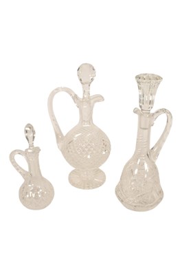 Lot 25 - THREE 20TH CENTURY CRYSTAL CUT GLASS DECANTERS WITH STOPPERS