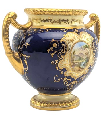 Lot 122 - COALPORT - EARLY 20TH CENTURY PORCELAIN TWIN HANDLED CENTREPIECE VASE WITH PAINTED SCENE