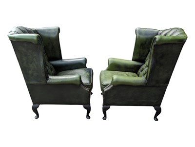 Lot 1047 - PAIR OF GREEN LEATHER CHESTERFIELD ARMCHAIRS