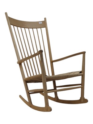 Lot 816 - BRITISH MODERN DESIGN - 20TH CENTURY RUSH BLONDE WOOD ROCKING ARMCHAIR
