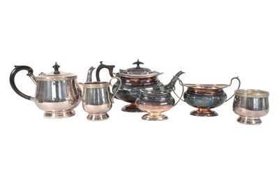 Lot 262 - TWO EARLY 20TH CENTURY SILVER PLATED TEA SERVICE SETS