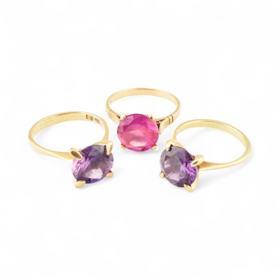 Lot 417 - THREE 18CT GOLD COLOURED SINGLE STONE RINGS