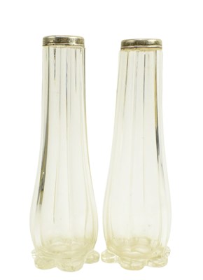 Lot 81 - PAIR OF GEORGE V HALLMARKED SILVER COLLARED GLASS STEM VASES