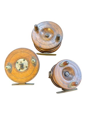 Lot 283 - COLLECTION OF THREE EARLY 20TH CENTURY BRASS & WOOD FISHING REELS