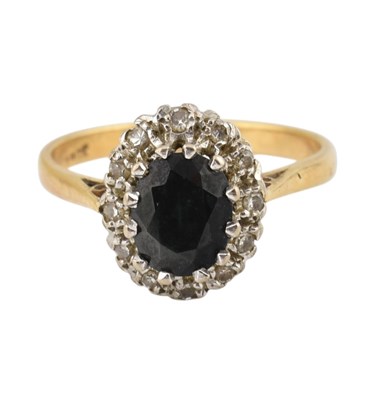 Lot 269 - 18CT GOLD SAPPHIRE & DIAMOND HALO RING