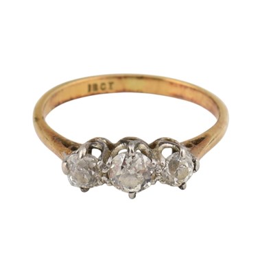 Lot 136 - 18CT GOLD & DIAMOND THREE STONE RING
