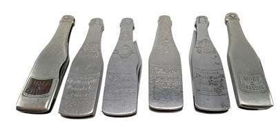 Lot 42 - SIX VINTAGE 20TH CENTURY NOVELTY ADVERTISING CHAMPAGNE BOTTLE SHAPED PENKNIVES