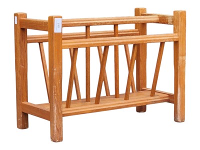 Lot 867 - MANNER OF GUY ROGERS - MID CENTURY TEAK MAGAZINE RACK