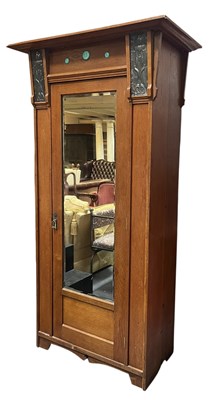 Lot 626 - MANNER OF SHAPLAND & PETTER - ARTS & CRAFTS CIRCA 1920S OAK SINGLE WARDROBE