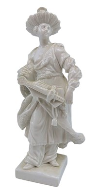 Lot 142 - GERMAN 19TH CENTURY KPM GLAZED PORCELAIN MUSICAL PLAYER FIGURINE