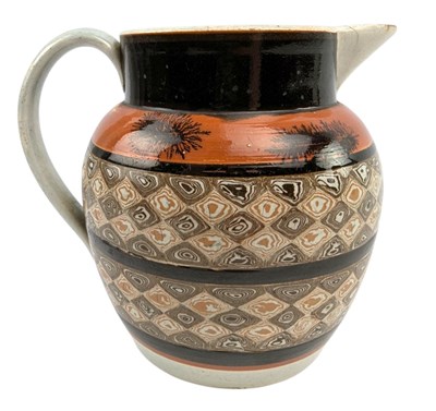 Lot 140 - 19TH CENTURY MOCHA WARE GLAZED CERAMIC AGATE WARE PITCHER JUG