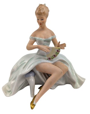 Lot 169 - WALLENDORF - 1920S ART DECO PORCELAIN CABINET FIGURINE OF A SEATED LADY WITH FAN