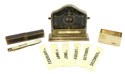 Lot 44 - AN EDWARD VII SILVER AND PIQUE PERPETUAL CALENDAR & SILVER KNIFE
