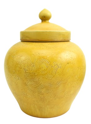 Lot 47 - CHINESE YELLOW GLAZED INCISED 'DRAGON' JAR 弘治款 黄釉暗刻龙纹 罐