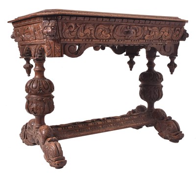 Lot 328 - 19TH CENTURY CARVED OAK WRITING TABLE DESK