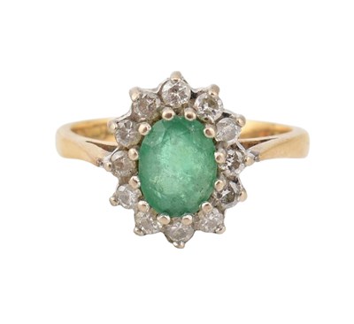 Lot 171 - HALLMARKED 18CT GOLD EMERALD & DIAMOND HALO RING
