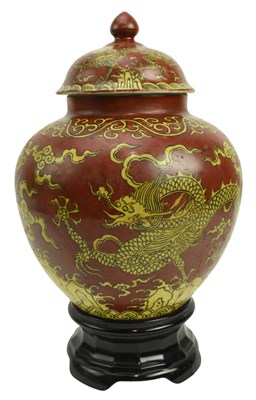 Lot 53 - YELLOW GROUND IRON RED 'DRAGON' PORCELAIN LIDDED JAR 嘉靖款 黄地红彩龙纹罐