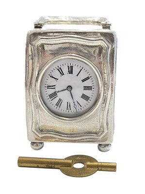 Lot 78 - 20TH CENTURY STERLING SILVER MINIATURE TRAVEL CLOCK