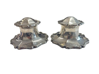 Lot 15 - PAIR OF GEROGE V HALLMARKED SILVER CAPSTAN INKWELLS