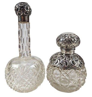 Lot 128 - TWO EDWARDIAN HALLMARKED SILVER & GLASS SCENT BOTTLES