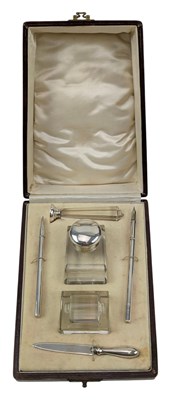 Lot 40 - CASED GEORGE V HALLMARKED SILVER & GLASS DESK SET
