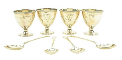 Lot 59 - FOUR EDWARD VII HALLMARKED SILVER EGG CUPS & SPOONS