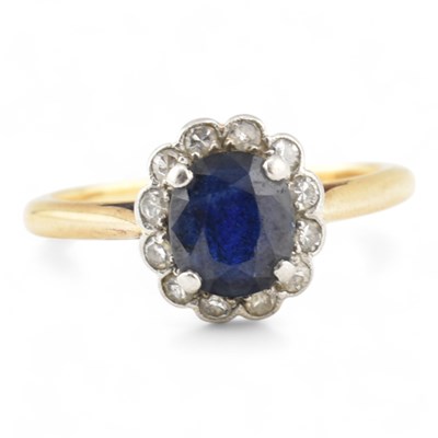Lot 110 - GOLD SAPPHIRE & DIAMOND HALO RING