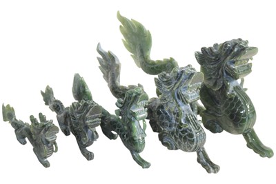 Lot 175 - FIVE CARVED STONE DRAGON FIGURES