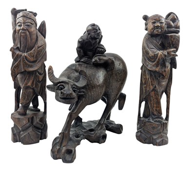 Lot 82 - THREE LATE QING HAND CARVED WOOD & SILVER INLAY FIGURINE 清 木刻人物立像