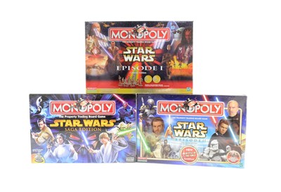 Lot 134 - STAR WARS - MONOPOLY - THREE FACTORY SEALED BOARD GAMES